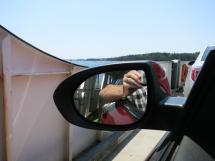 on the ferry taking a photo out the car window - 30 years later
